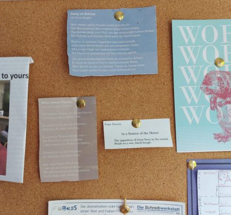 A bulletin board with a few scraps of poetry. "Gang im Schnee" by Ernst Stadler, "In a Station of the Metro" by Ezra Pound, "Mein blaues Klavier" by Else Lasker-Schüler